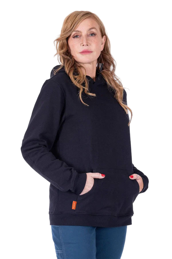 Woman wearing a black hoodie with a small orange tag on a white background
