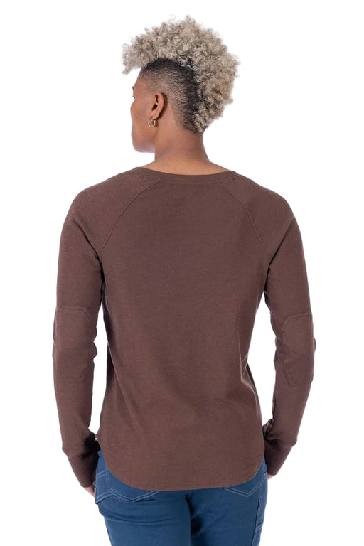 Person wearing a brown long-sleeve shirt on a white background