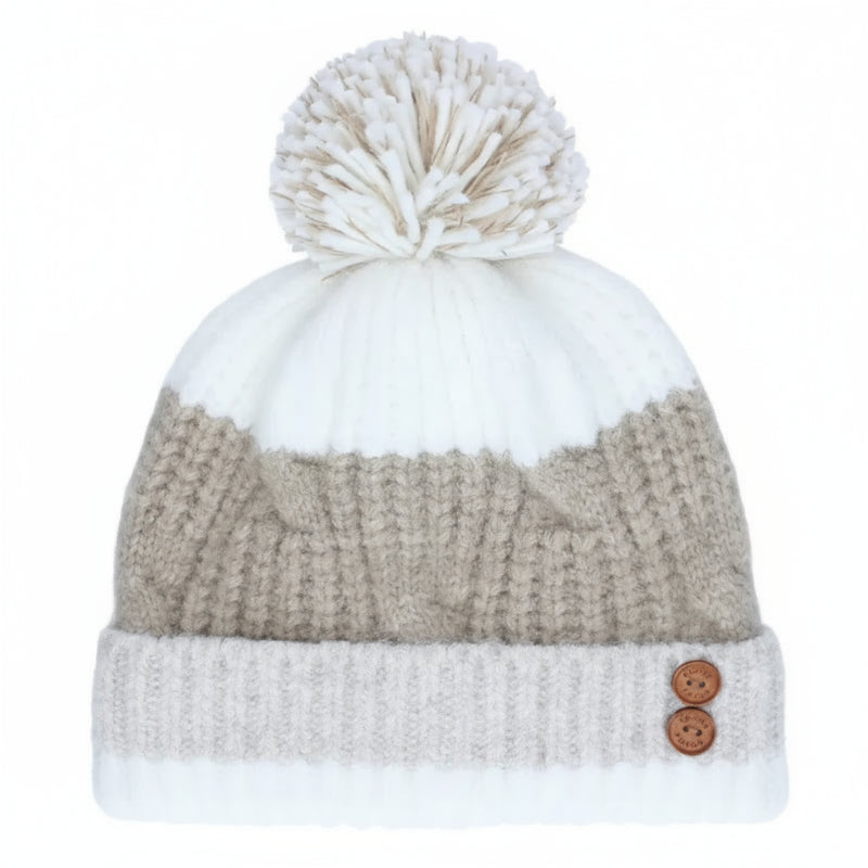 Knitted beanie with pom-pom and button details on a white background