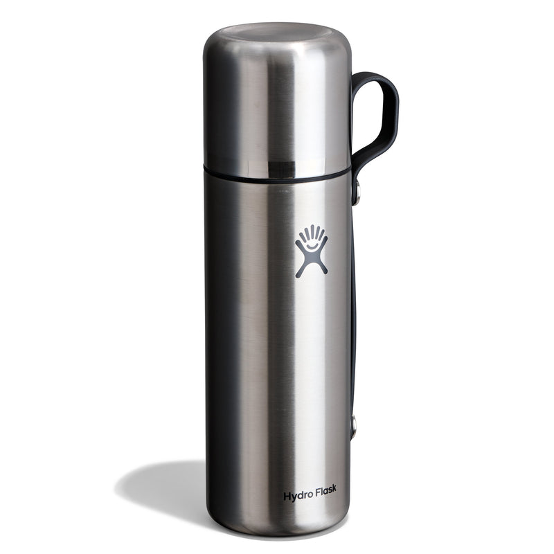 A Hydro Flask stainless steel water bottle with a black handle and logo, shown on a clean white background.
