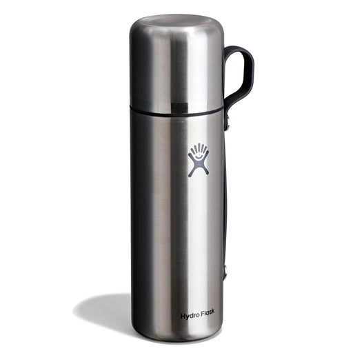 A Hydro Flask stainless steel water bottle with a black handle and logo, shown on a clean white background.