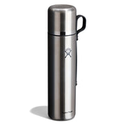 A Hydro Flask stainless steel vacuum flask with a black handle, shown on a white background with a soft shadow.