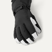 Black gloves with white fingertips on a light gray background