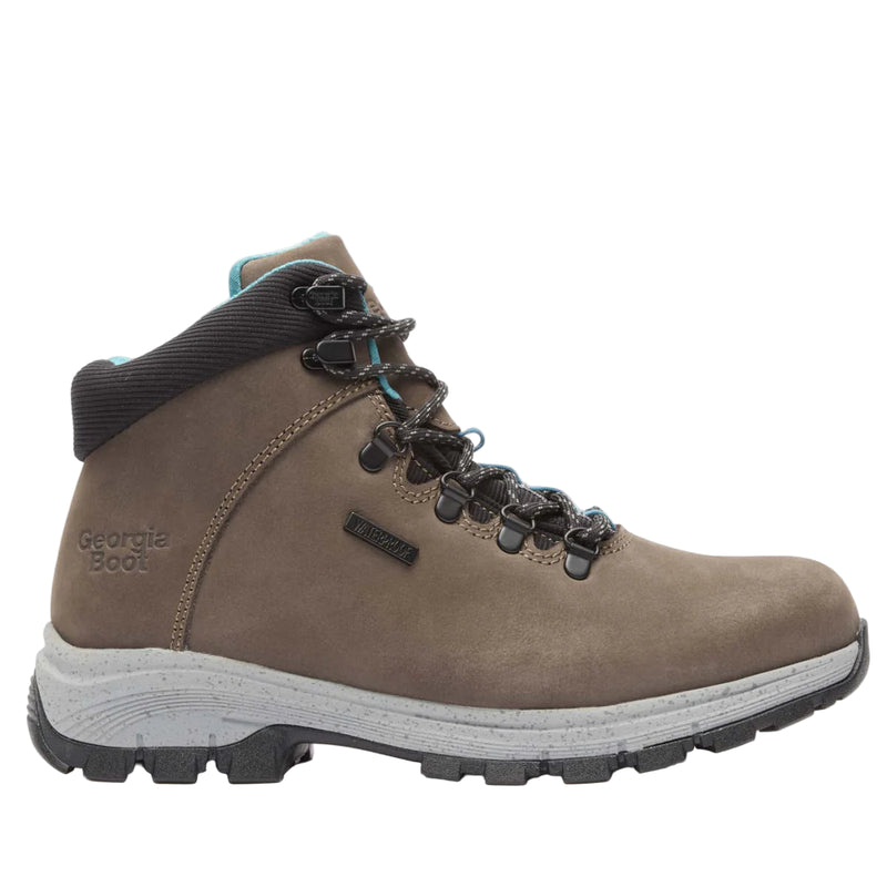 Brown hiking boot with black laces on a white background