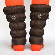 Back view of brown, waterproof gaiters against a white background.