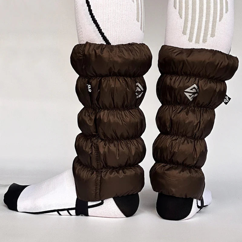 Back view of brown, waterproof gaiters against a white background.