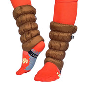 Front and side view of a model wearing light brown gaiters over orange socks against a white background. 