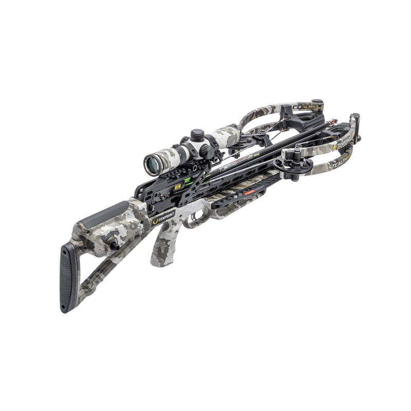 A crossbow with a mounted scope, featuring a black central body and gray and white camouflage stock, grip, and limbs, shown on a solid white background.