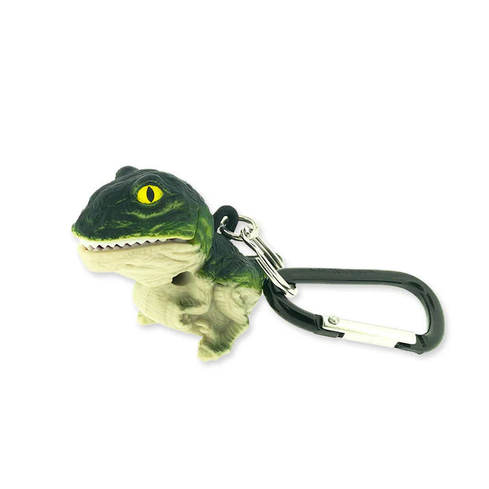 Mini dinosaur-shaped flashlight with a black carabiner attached to the bac against a white background. 