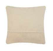 Beige pillow on a white background