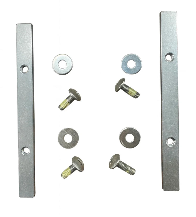 Metal brackets and screws on a white background