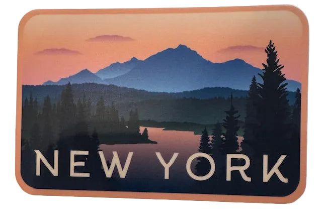 Sticker with a mountain and lake design and 'New York' text on a peach border.