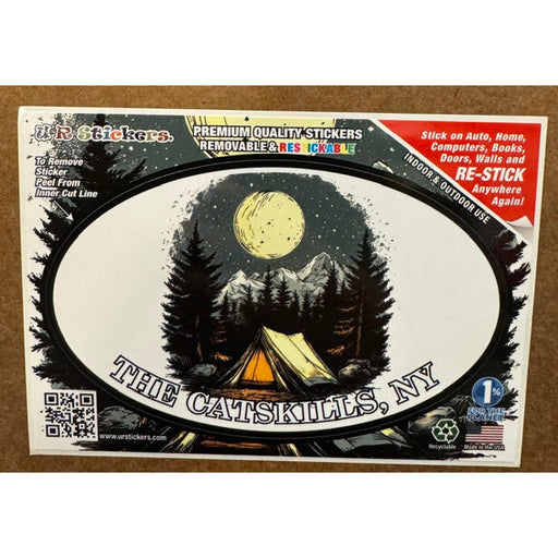 Sticker of a campsite under a full moon on a wooden background.