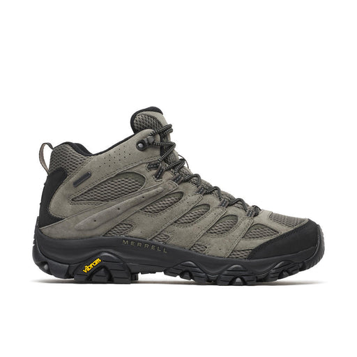 Olive hiking boot on a white background.