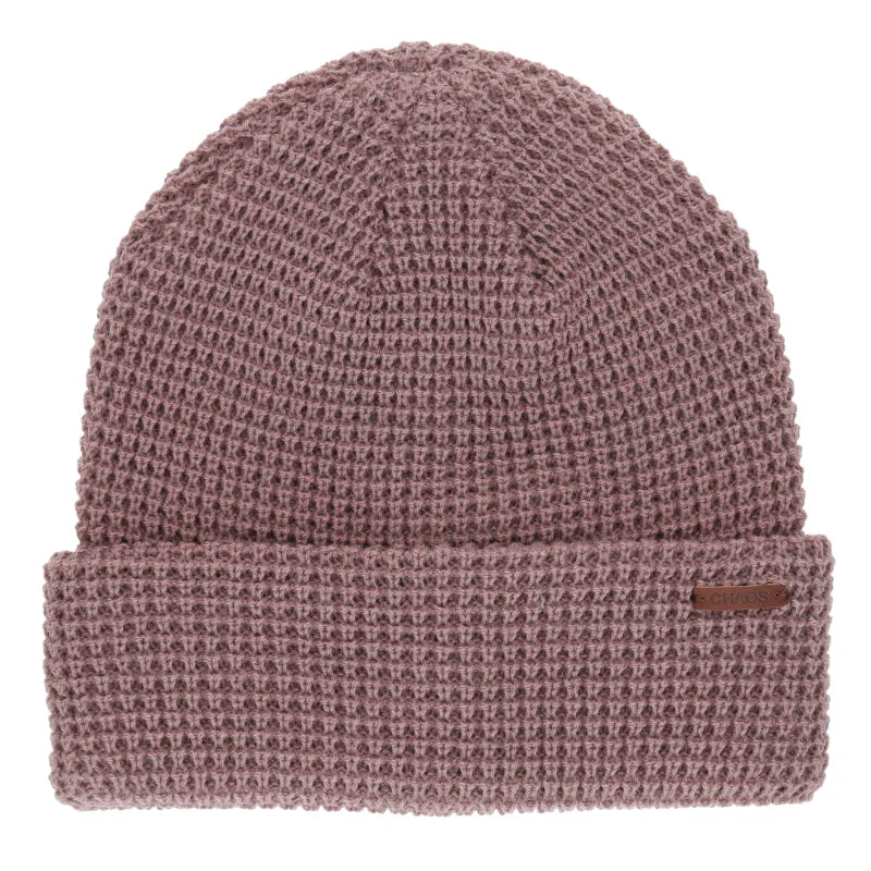 Pink knit beanie against a white background. 