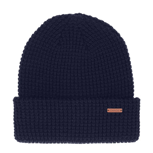 Navy blue knit beanie against a white background. 