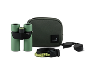 Green binoculars alongside a carrying case and various other accessories on a white background.