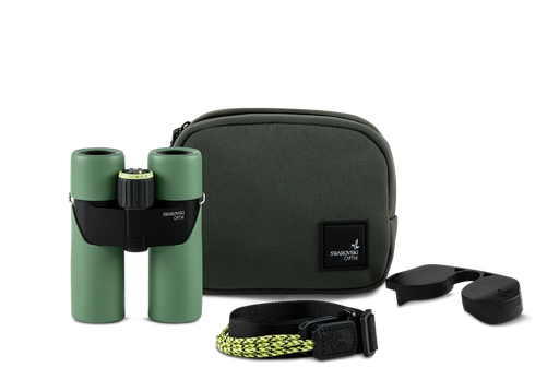 Green binoculars alongside a carrying case and various other accessories on a white background.