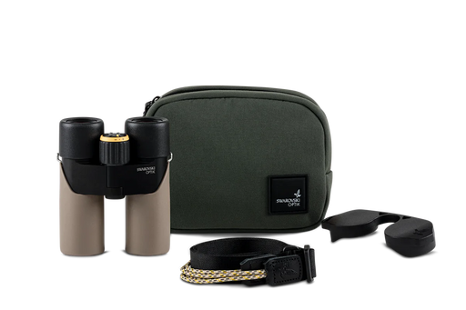 Brown binoculars alongside a carrying case and various other accessories on a white background.