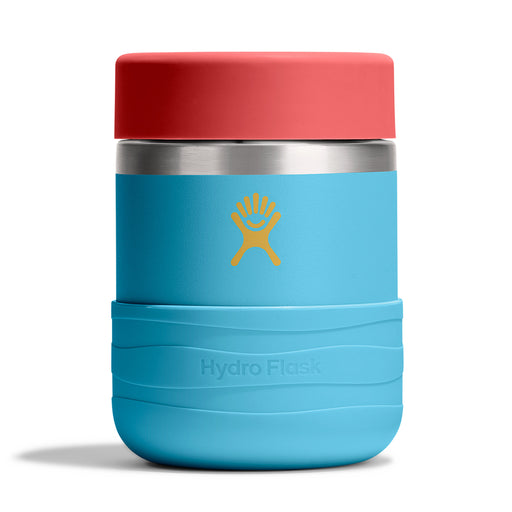 A Hydro Flask insulated tumbler with a bright blue body, a coral-red lid, and a yellow Hydro Flask logo on the front, set against a plain white background.