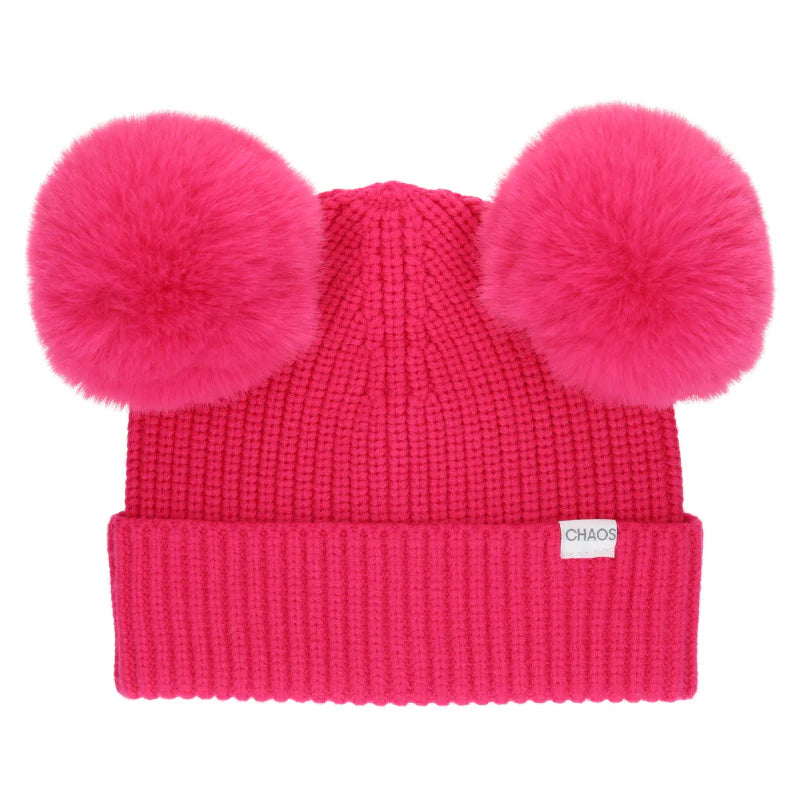 Hot pink pom pom beanie against a white background. 