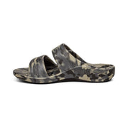 The side of a camouflage sandal with 2 straps on a white background