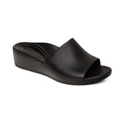 Side view of a black sandal against a white background. 