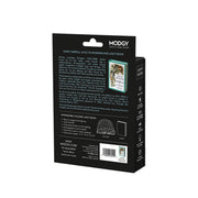 The back of a black retail box for the Modgy Lewis Carroll Alice in Wonderland Light Book, showing product description text, a small cover preview, and a barcode on a white background.