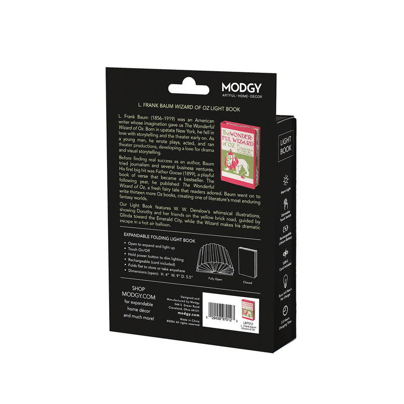 The back of the black packaging box for the Modgy L. Frank Baum Wizard of Oz Light Book, featuring product details, a small preview of the book cover, and a barcode on a white background.