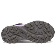 Close-up of a shoe sole with a brand logo on a white background