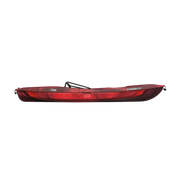 Side view of a dark red kayak against a white background. 