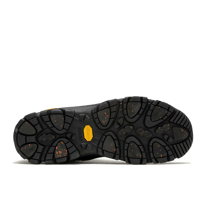 Black shoe sole with a yellow label on a white background