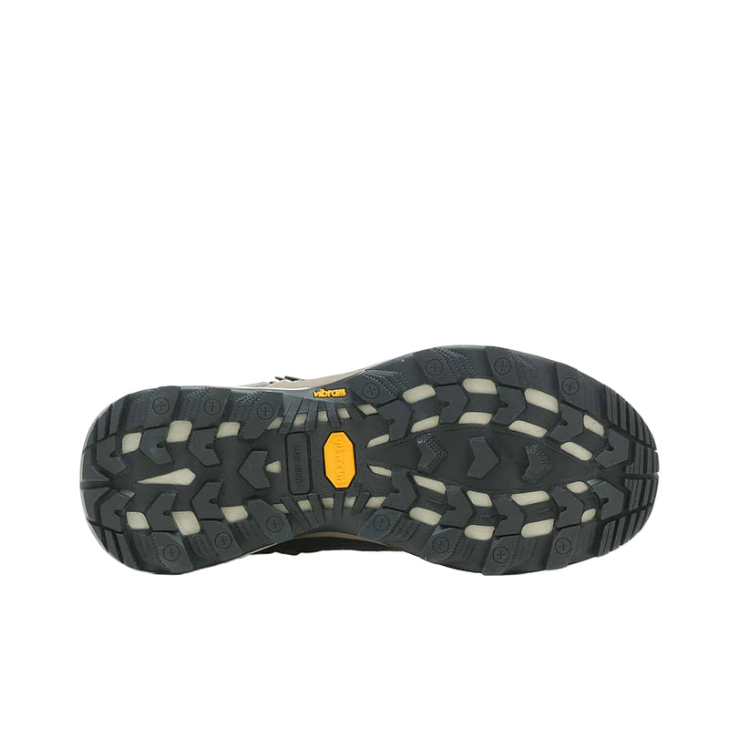 Close-up of a hiking shoe sole with brand logo on a white background