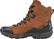 Side view of a dark brown boot with black accents against a white background.