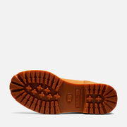 Close-up of a brown boot sole on a white background