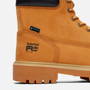 Close-up of a tan Timberland Pro boot with brand logo on a white background
