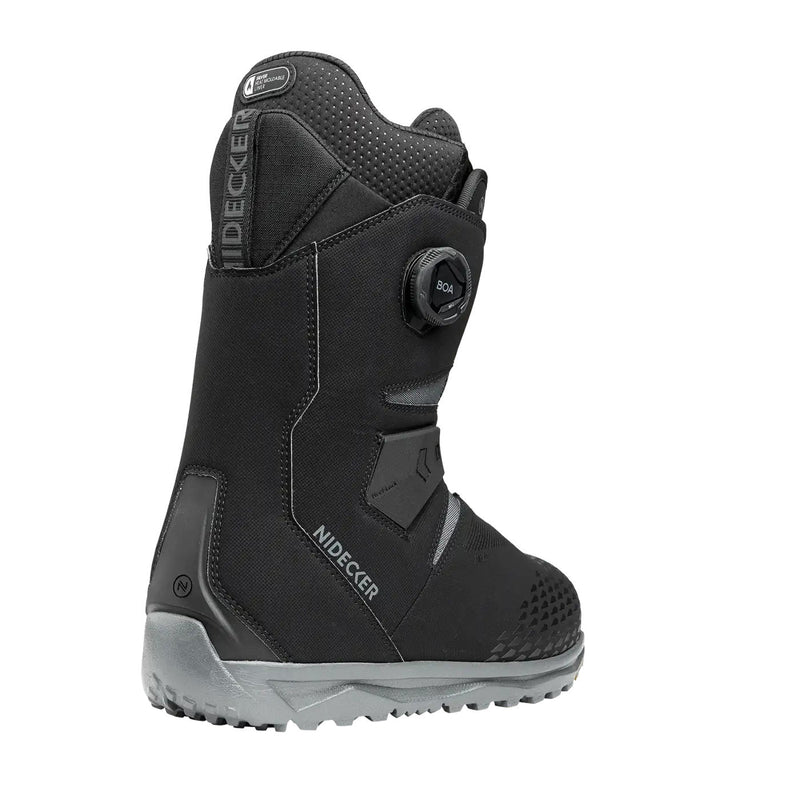 Back view of a black snow boot with a Nidecker logo against a white background. 