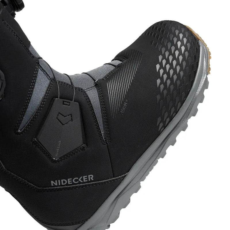 Side view of a black snow boot with a Nidecker logo against a white background. 