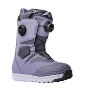 Side view of a purple and white snow boot against a white background. 