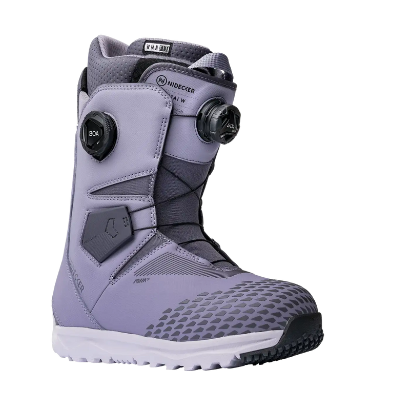 Side view of a purple and white snow boot against a white background. 