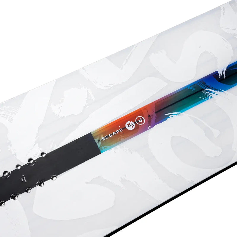 Close up of a white snowboard with black and multicolor accents against a white background. The word escape is written on a multicolor strip on the snowboard. 