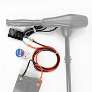 A red and black cable next to an extension handle and a battery pack on a white background.