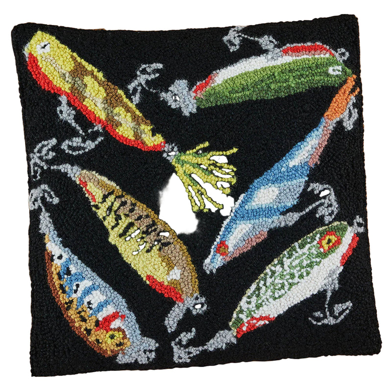 Throw pillow featuring various fishing lures against a white background. 