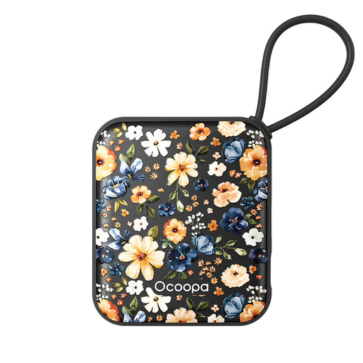 Floral-patterned hand warmer with a black strap on a white background