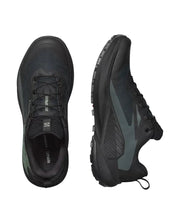 Black athletic shoes with visible brand logo on a white background