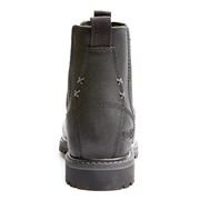 Black leather boot with a strap on a white background