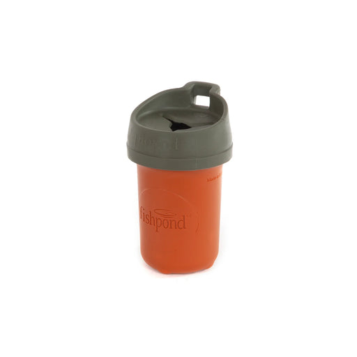An orange container with a gray lid on a white background