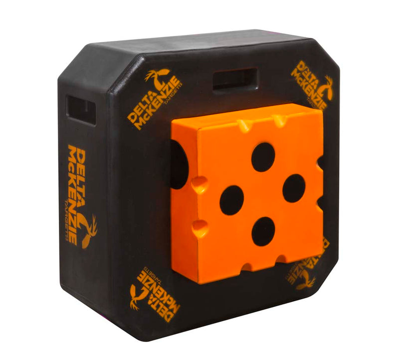 Black square target with orange in the center with four black dots on it against a large background. 