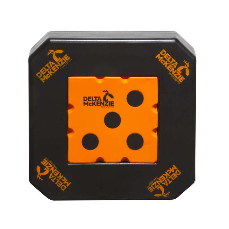 Delta McKenzie target with a black body and an orange center section featuring four circular target spots.