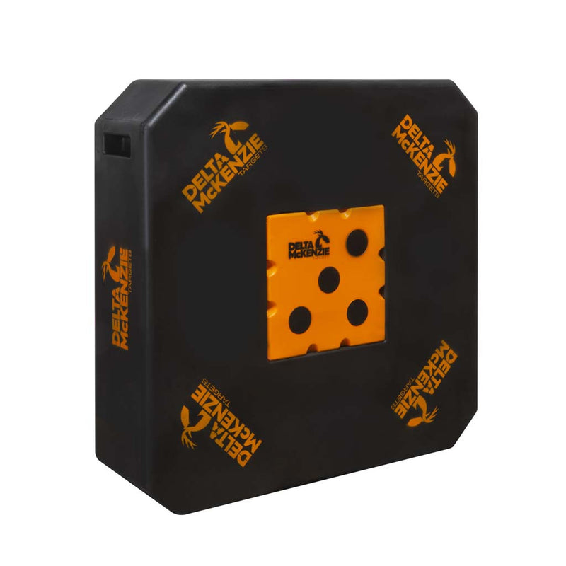 A black rectangular Delta McKenzie branded target block with an orange center insert featuring circular target spots, shown on a plain white background.